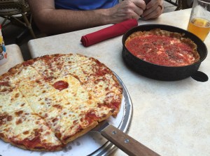 A deep dish and thin crust from Pizano's, Chicago.